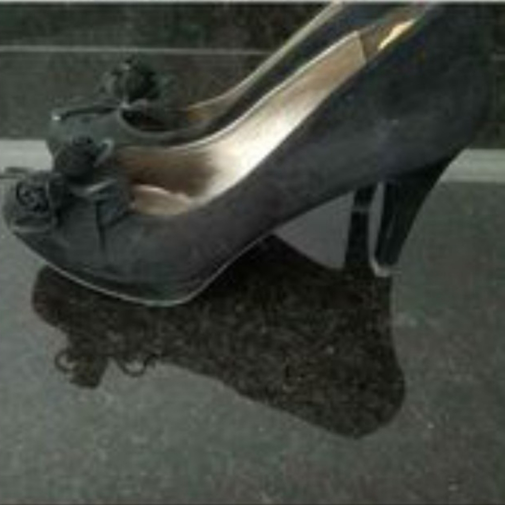 Black suede shoes from Italy. I'm trying to clean up my closet. Worn only once